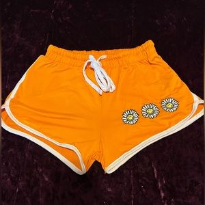 Barley Worn Orange Sunflower Shorts.